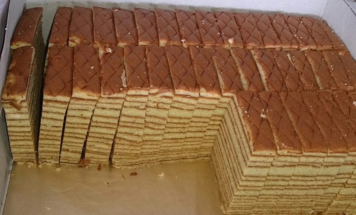 Slices of kueh lapis showing dozens of thin layers